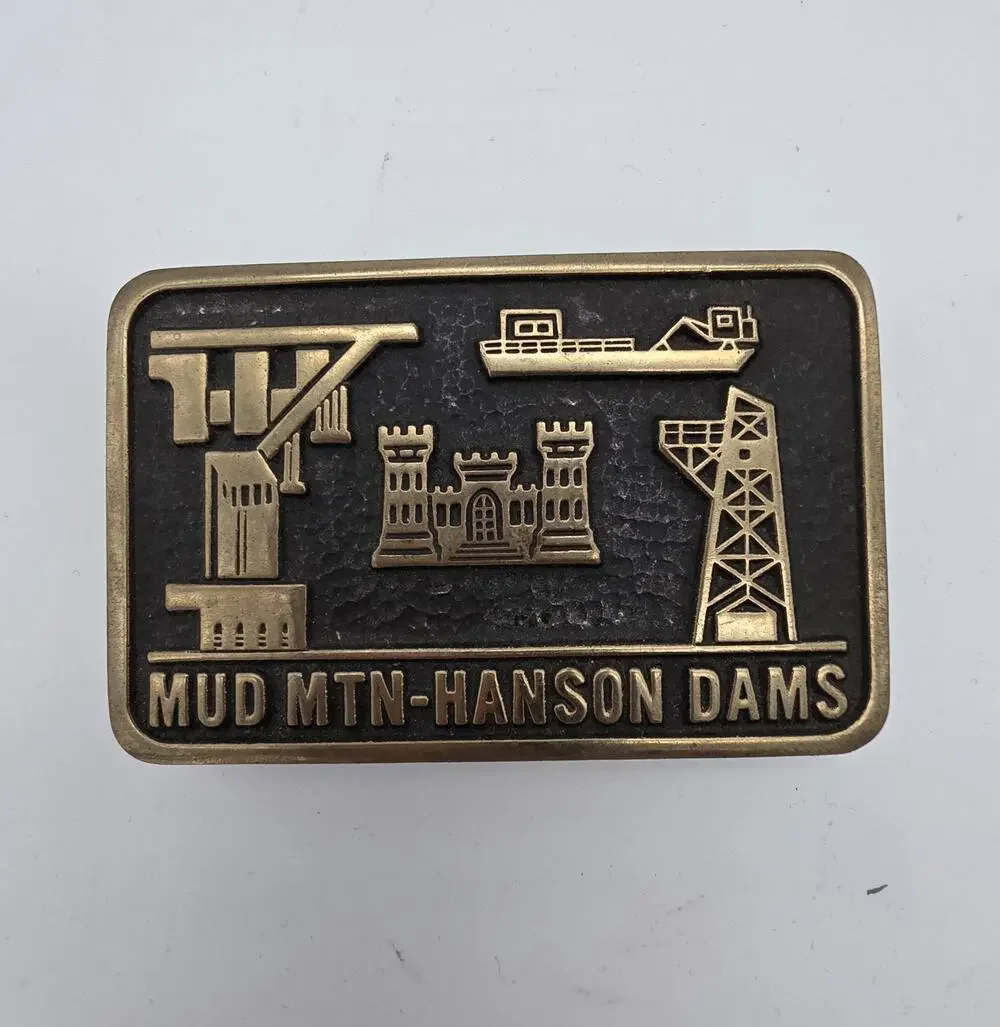 Vintage 1989 Mud Mountain Hanson Dams Solid Brass Belt Buckle USA